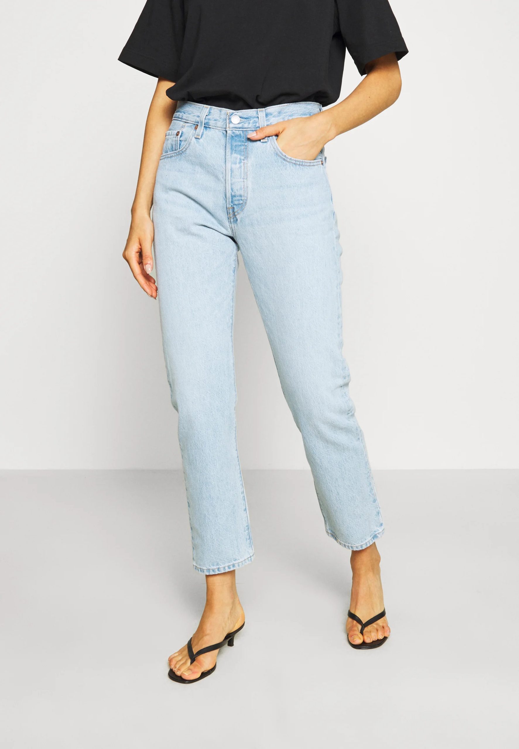 Levi's cropped jeans have become a popular fashion staple, offering a unique style that combines the classic denim look