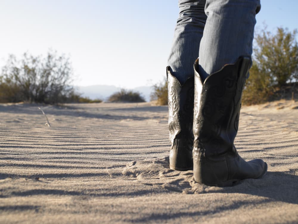 Skinny jeans and cowboy boots offers a versatile and stylish pairing that exudes a blend of classic Western charm