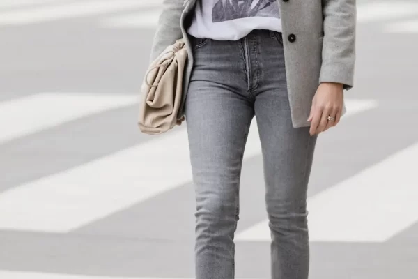 Grey jean outfits are a versatile wardrobe staple that can be dressed up or down for various occasions. Their neutral hue provides
